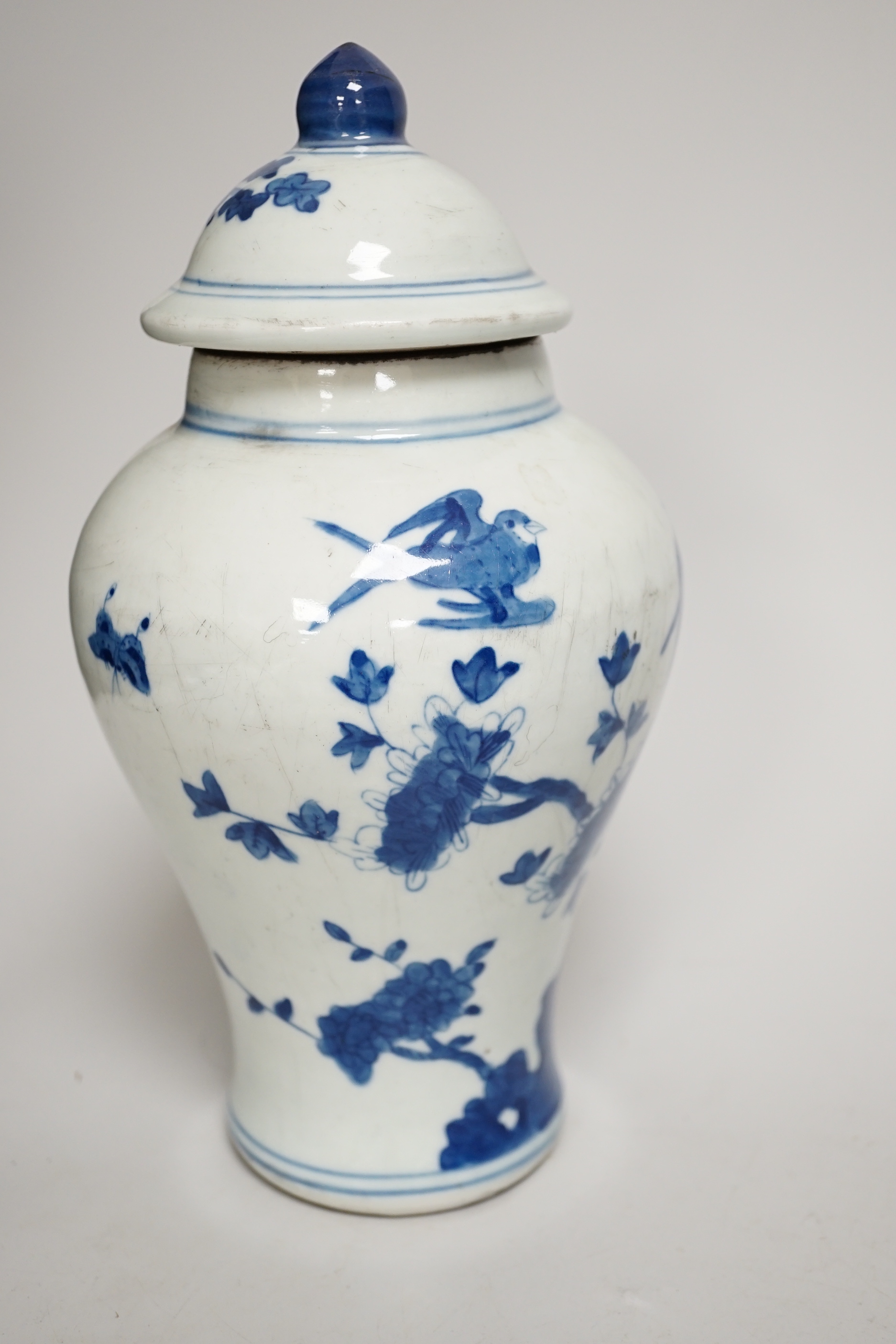 Chinese blue and white ceramics and a miniature famille rose vase, the largest 25cm high